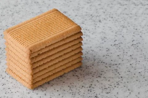 Rectangular shortbread cookies on a light marble top. Homemade baking. Stock Photos