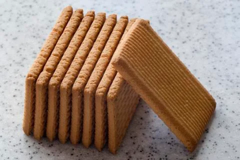 Rectangular shortbread cookies on a light marble top. Homemade baking. Stock Photos