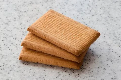 Rectangular shortbread cookies on a light marble top. Homemade baking. Foto stock