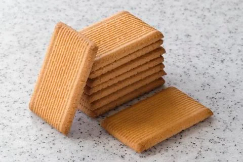 Rectangular shortbread cookies on a light marble top. Homemade baking. Stock Photos