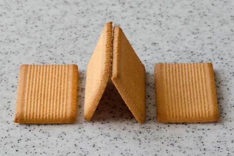 Rectangular shortbread cookies on a light marble top. Homemade baking. Foto stock