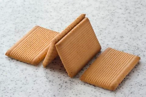 Rectangular shortbread cookies on a light marble top. Homemade baking. Stock Photos