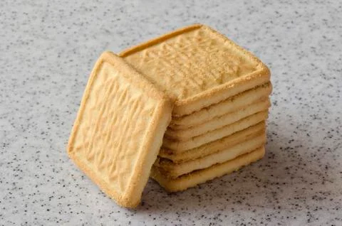 Rectangular shortbread cookies on a light marble top. Homemade baking. Stock Photos