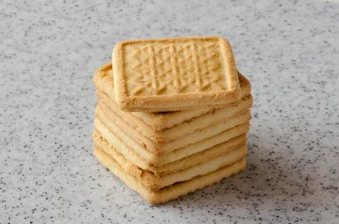 Rectangular shortbread cookies on a light marble top. Homemade baking. Stock Photos