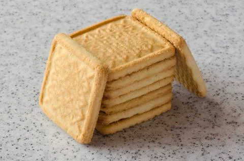 Rectangular shortbread cookies on a light marble top. Homemade baking. Stock Photos