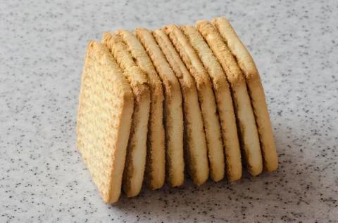 Rectangular shortbread cookies on a light marble top. Homemade baking. Stock Photos