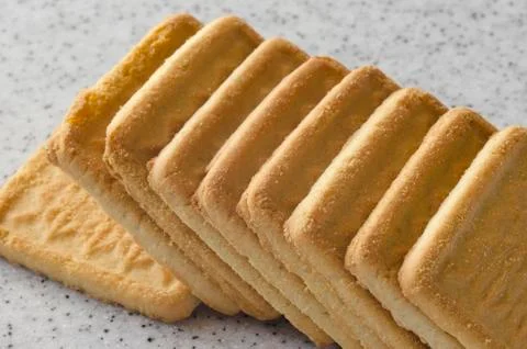 Rectangular shortbread cookies on a light marble top. Homemade baking. Foto stock