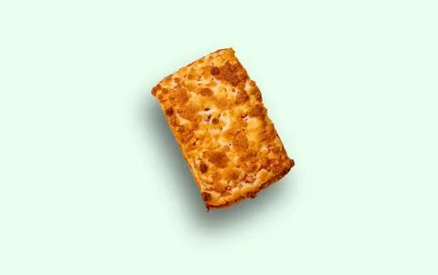 Rectangular shortbread with a shadow, isolated on a light green background. C Foto stock