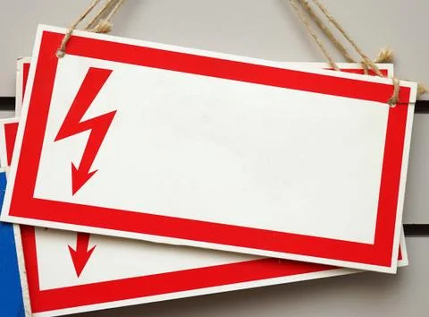 Rectangular sign with a red border and zipper. Electrical hazard. Empty temp Stock Photos