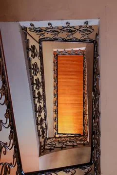 Rectangular spiral staircase viewed from below Photos