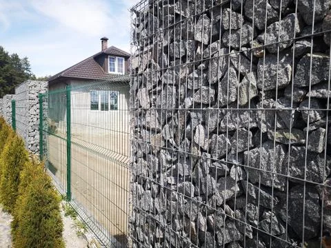 Rectangular stone fence. stone building Stock Photos