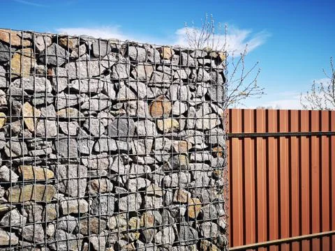 Rectangular stone fence. stone building Foto stock