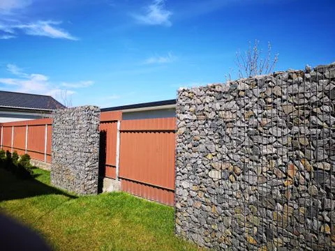 Rectangular stone fence. stone building Stock Photos