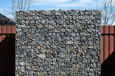 Rectangular stone fence. stone building Stock Photos