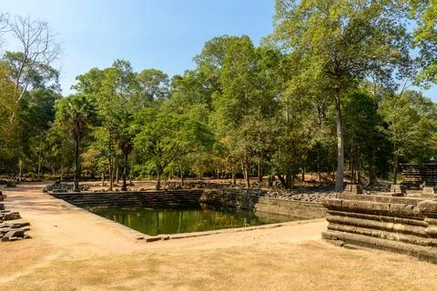 Rectangular stone pond at Baphuon temple ruins Stock Photos