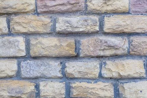 Rectangular stone uneven crocheted limestone cobblestone with cement lines be Stock Photos