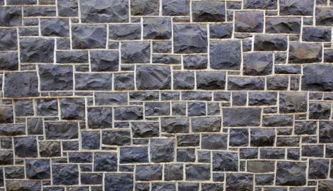 Rectangular stone wall far Foto stock