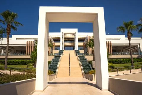 Rectangular symmetrical arches with steps and palm trees Stock Photos