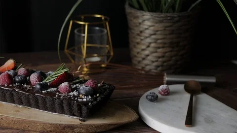 Rectangular Tart Chocolate cheesecake with fresh berries. Stock Footage 98552490