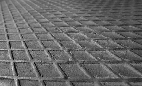 Rectangular textured pattern on metal sheet surface Stock Photos