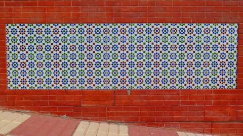 Rectangular tiled insert in brick wall Foto stock