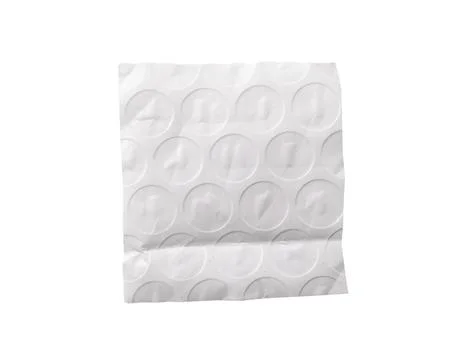 Rectangular torn piece of bubble wrap with embossed circular pattern, visible Stock Photos
