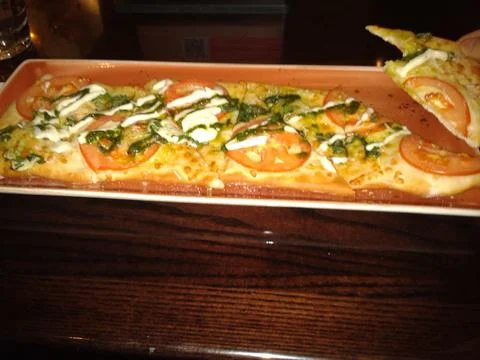 Rectangular traditional pizza Stock Photos