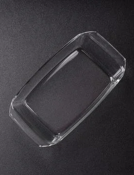 A rectangular transparent glass tray for baking and cooking at home. The gl.. Stock Photos