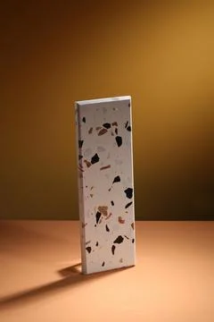 Rectangular tray on beige background with light on the wall 스톡 사진