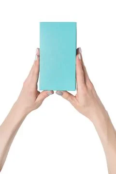 Rectangular turquoise box in female hands. Top view. Isolate 스톡 사진