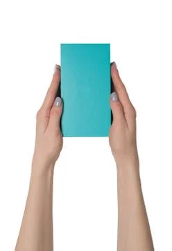 Rectangular turquoise box in female hands. Top view. Isolate Stock Photos