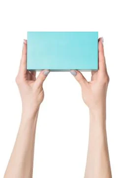 Rectangular turquoise box in female hands. Top view. Isolate 스톡 사진