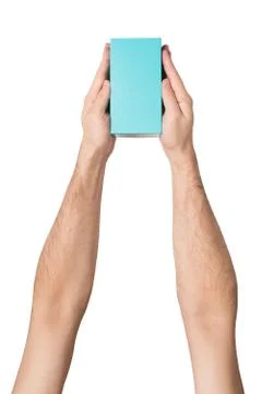 Rectangular turquoise box in male hands. Top view. Isolate Stock Photos