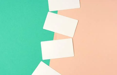 Rectangular white blank business cards on a color background 스톡 사진