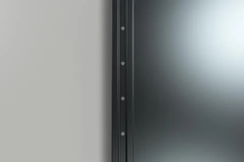 Rectangular white plate on black and white background with rivets 库存插图