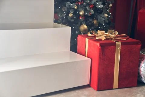 Rectangular white podium for the presentation of goods with space for copying Stock Photos