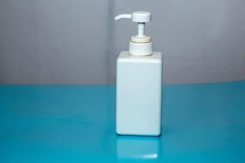 A rectangular white pump bottle Stock Photos