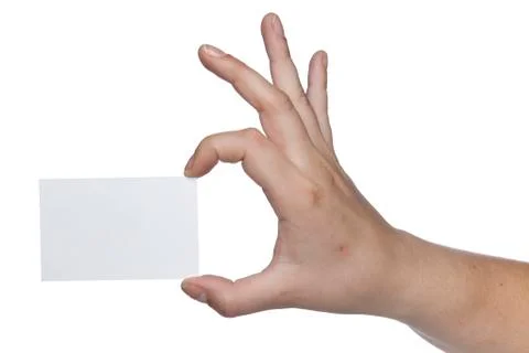 Rectangular white sheet held in the fingers, copy space Stockfoto's