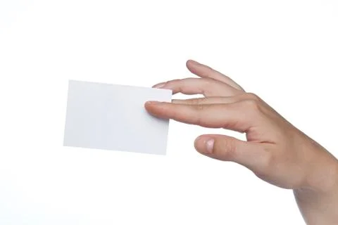 Rectangular white sheet held in the fingers, copy space Stock Photos