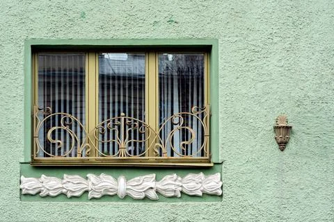 Rectangular window with bas-relief. Stock Photos