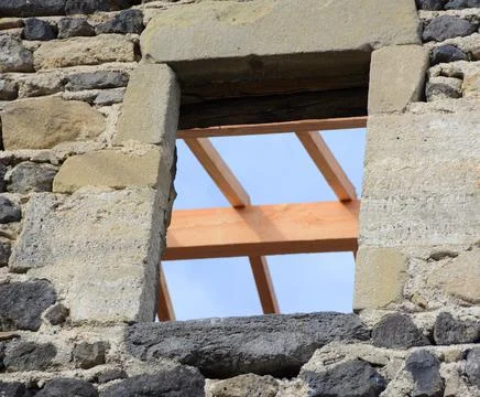 Rectangular window on the stone building Foto stock