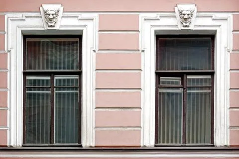 Rectangular windows with bas-relief. Stock Photos