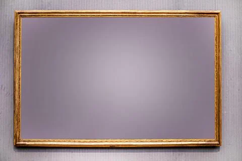 Rectangular wooden frame on a gray background, mockup for your ad and text Stock Photos