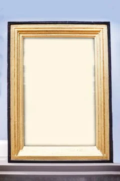 Rectangular wooden frame on a gray background, mockup for your ad and text Stock Photos