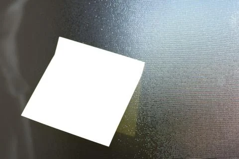 Rectangular yellow note paper attached to unclear mirror. A piece of square Stock Photos