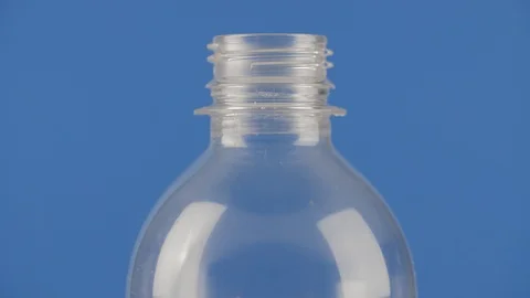 Recyclable plastic bottle spinning Stock Footage 98740650