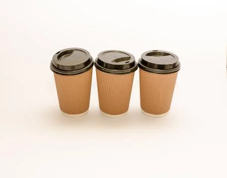 Recyclable take out coffee or tea cups with lids Stock Photos
