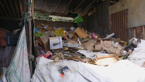 Recyclable waste pickers work on garbage separation, Stock Footage 128124038