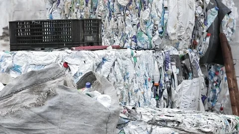 Recyclable waste sorting, close-up on hands, in Vila Prudente, São Paulo Stock Footage 317648998