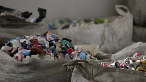 Recyclable waste sorting, close-up on hands, in Vila Prudente, São Paulo Stock Footage 317649040